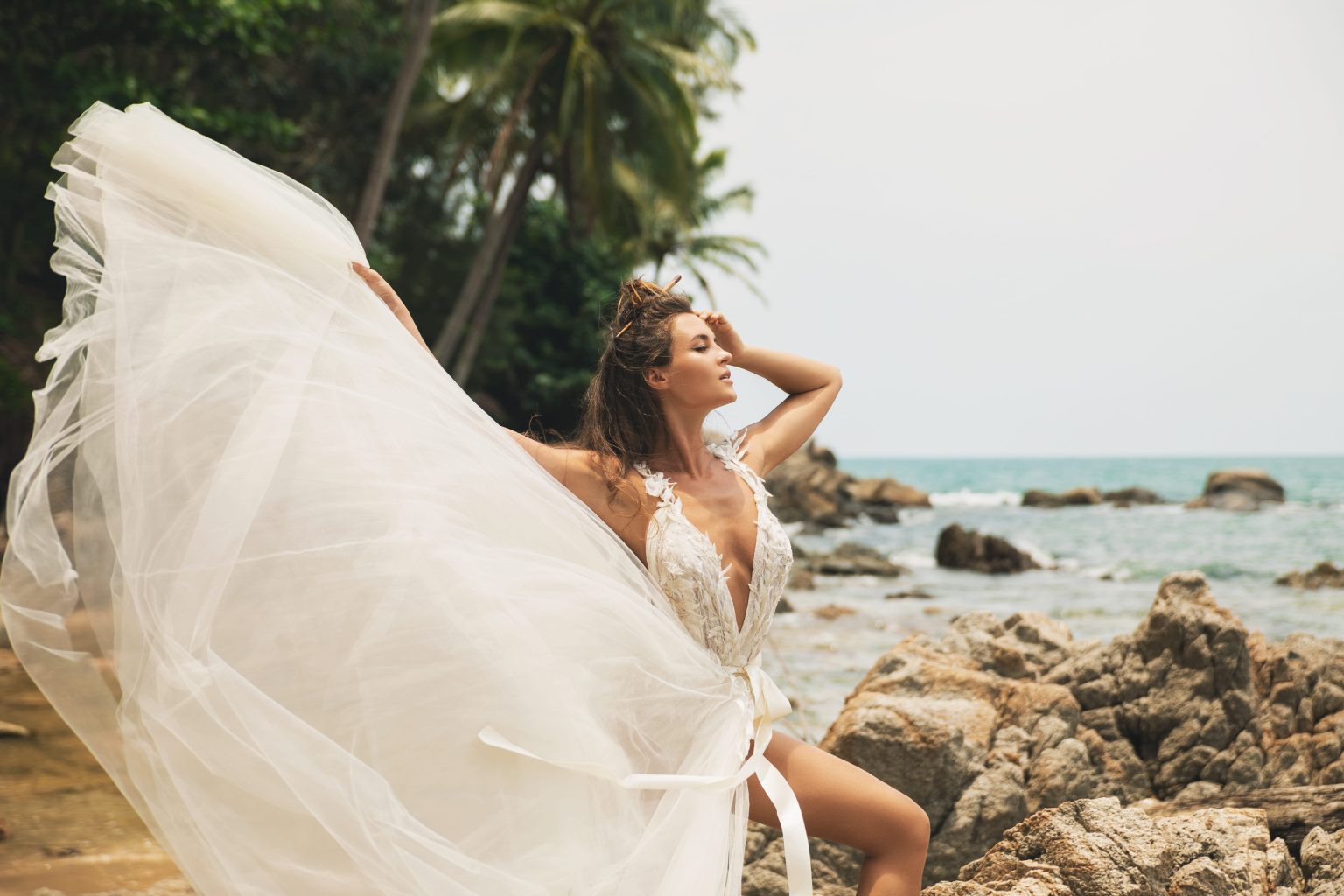 bride-wearing-beautiful-wedding-dress-tropical-beach (1)